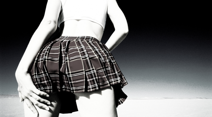 the back girl in a short plaid skirt - reminiscent of Britney Spears (#FreeBritney Movement)