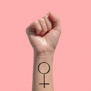 womens hand with female symbol