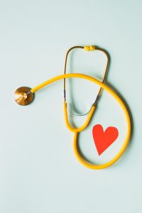 stethoscope with red paper heart