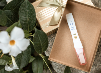 Secondary Infertility; pregnancy test in gift box