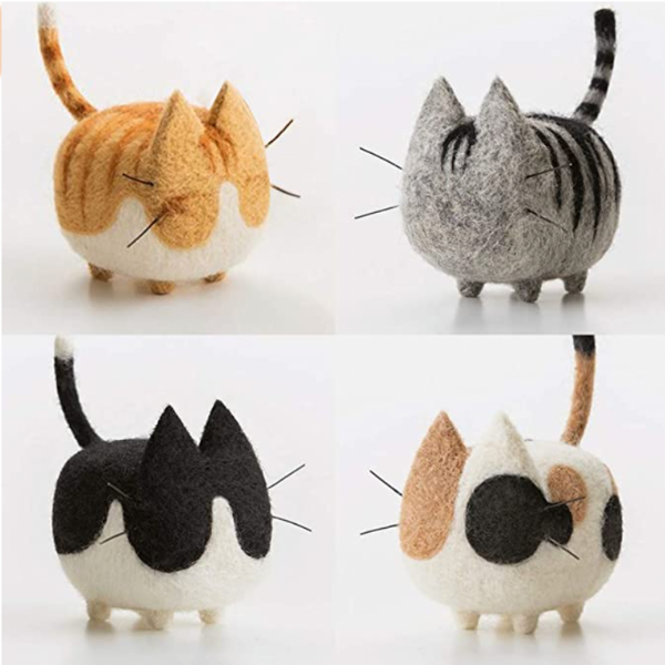 The felted kitties are an example of what you can make with the needle felting starter kit and are excellent gifts for crafters